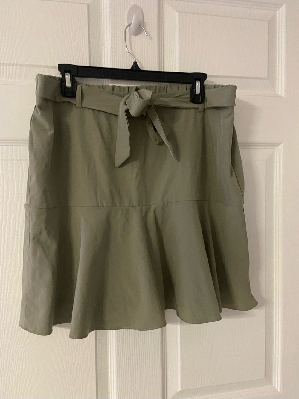 T40a- SOHO APPAREL Olive Green Belted Peplum Hem Skirt